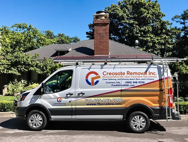 Laguna Hills Chimney Sweep technician removing creosote safely in Laguna Hills, CA